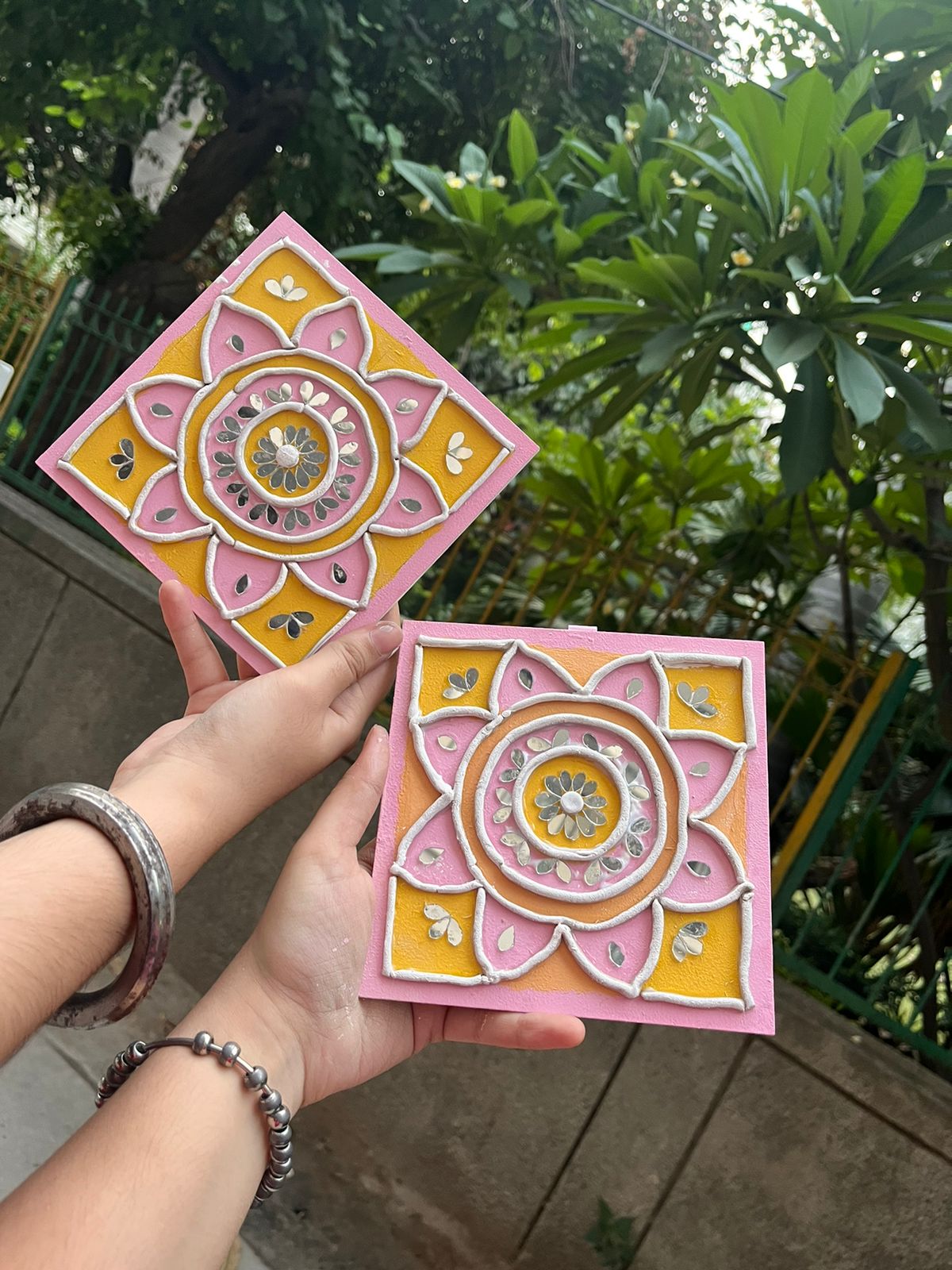 Lippan mirror mandala held up